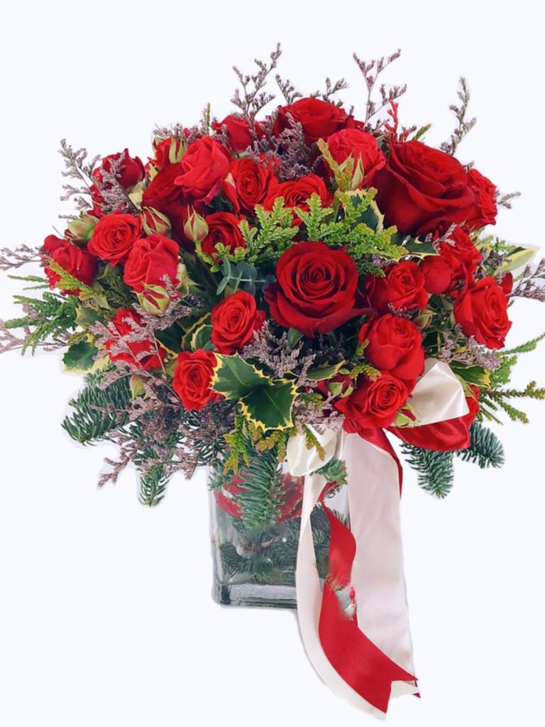 Vase of red roses perfect for anniversary flowers